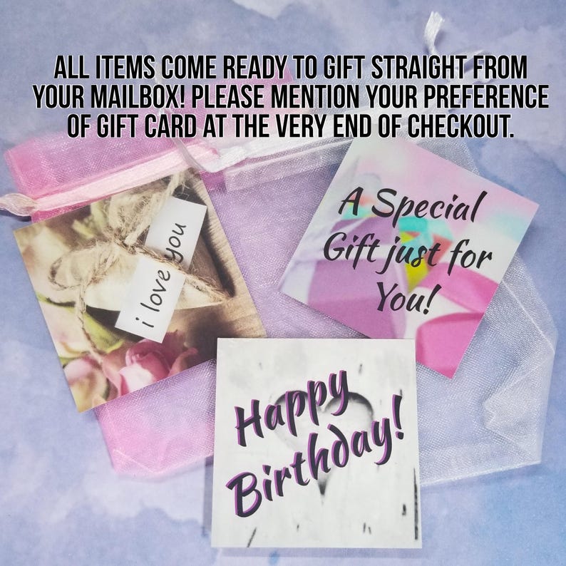 May include: Three gift cards with different messages. The first card has a floral design and the text "i love you". The second card has a colorful design and the text "A Special Gift just for You!". The third card has a white background with the text "Happy Birthday!" in purple.
