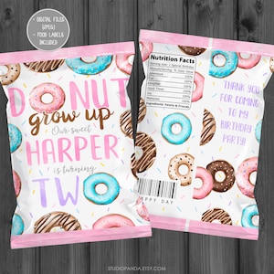 May include: Pink and white donut-themed treat bag with the text "Donut grow up Our sweet Harper is turning TWO" and a nutrition facts label that says "Serving size: 1 Special Birthday".