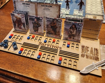 May include: A wooden game board for the Dead of Winter board game. The board has a grid of squares with red and blue tokens. The board also has a section for the "Leader" and "Survivors". There are five cards on the board, each with a different character and a number on it. The text on the cards reads "James Meyers", "Daniel Smith", "Ashley Ross", "David Garcia", and "Round Summary".