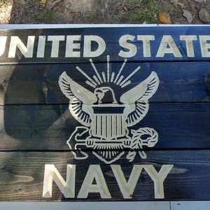 Carved United States Navy sign