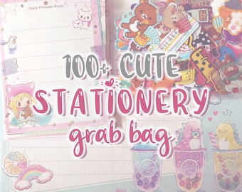 May include: A pink and white grab bag filled with over 100 cute stationery items. The bag includes stickers, notepads, and other fun items. The text "100+ CUTE STATIONERY grab bag" is written in pink letters on the front of the bag.