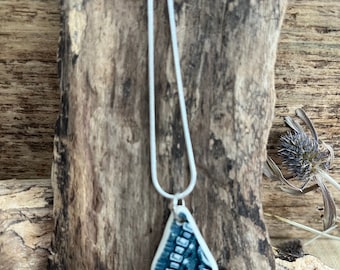 Scottish Blue willow sea pottery carved  teardrop  and sterling  silver pendant on 18 inch  chain.