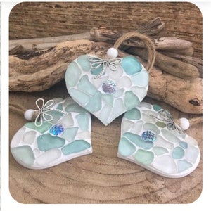 Small Sea glass mosaic  hanging heart with a mermaid scale and a silver dragonfly charm