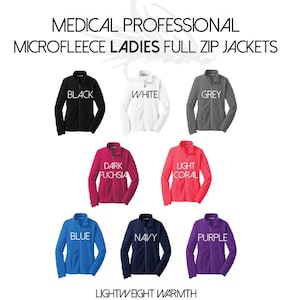 May include: A selection of ten women's full-zip microfleece jackets in various colors, including black, white, grey, dark fuchsia, light coral, blue, navy, and purple. The jackets are lightweight and warm.