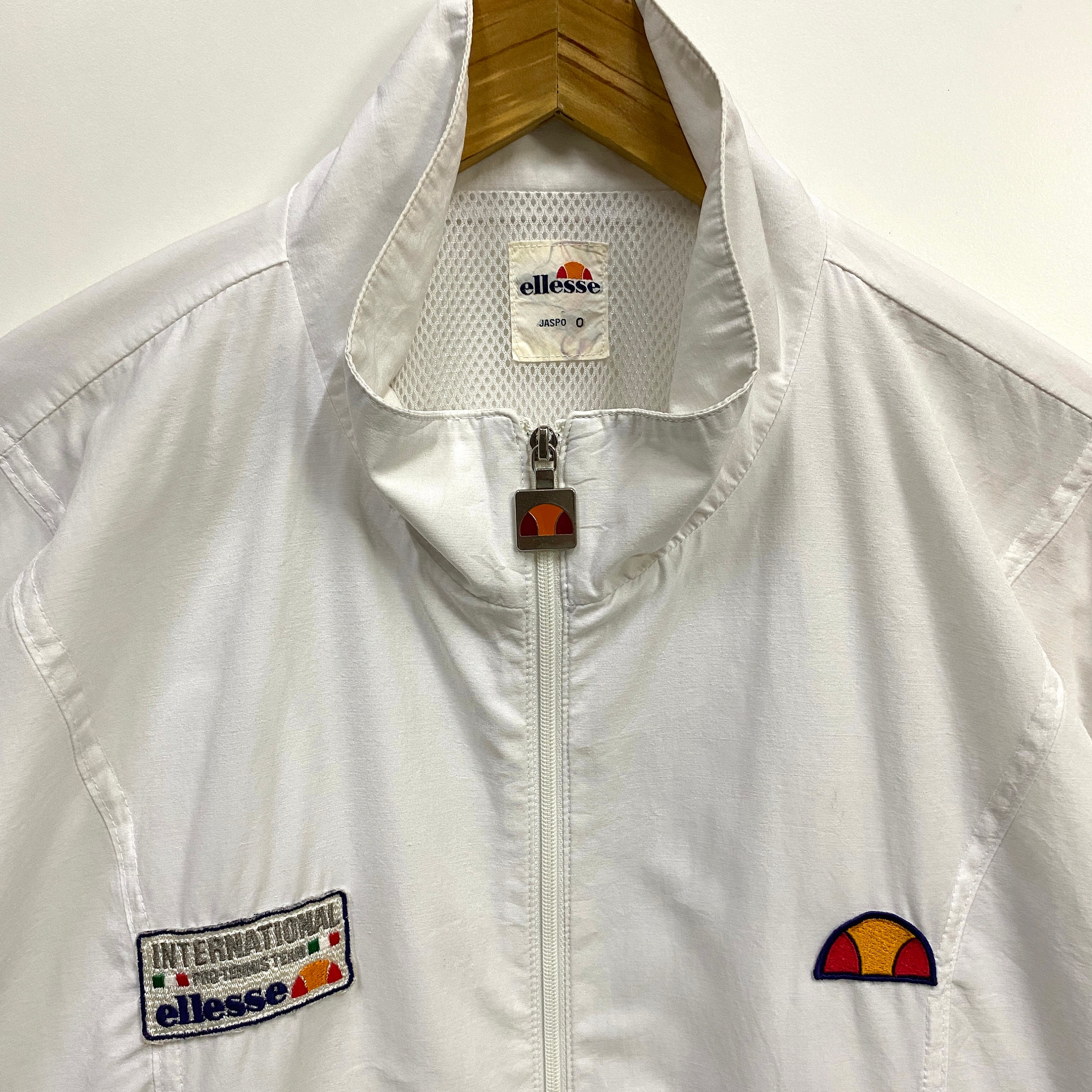 90s ellesse エレッセ 刺繍ロゴ マルチパネル トラックジャケット 6fcfc404f12e779b2d0294f6cb7ef5