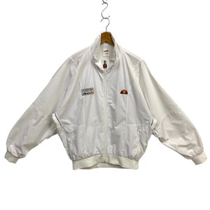 Vintage 90s Ellesse Windbreaker Jacket International Pro Tennis Team Embroidered Patch Logo Athletic Wear White Medium XLarge