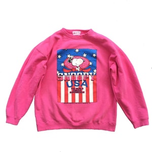 Vintage 90s Peanuts Snoopy Sweatshirt Peanuts Crewneck  Snoopy Sweater Pullover Cartoon The world Famous Superbeagle Print Pink Size Medium