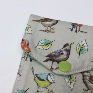 Portatarjetas/monedero de pájaros de jardín