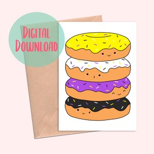 May include: A greeting card featuring a stack of four cartoon donuts with different colored frosting: yellow, white, purple, and black. Each donut has sprinkles and a smiling face. The card is labeled "DIGITAL DOWNLOAD" and is in a brown envelope.