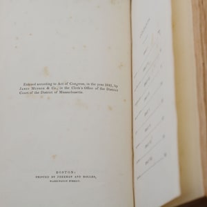 May include: A page from an old book with text about copyright information. The text reads "Entered according to Act of Congress, in the year 1841, by JAMES MUNROE & Co., in the Clerk's Office of the District Court of the District of Massachusetts. BOSTON: PRINTED BY FREEMAN AND BOLLES, WASHINGTON STREET."