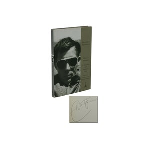 May include: A signed hardback book titled "Fear and Loathing in Las Vegas: A Savage Journey to the Heart of the American Dream" by Hunter S. Thompson. The book cover features a black and white photograph of a man wearing sunglasses.