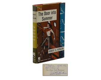 La puerta al verano ~ FIRMADO por ROBERT A. HEINLEIN ~ Primera edición ~ 1ra ~ 1957