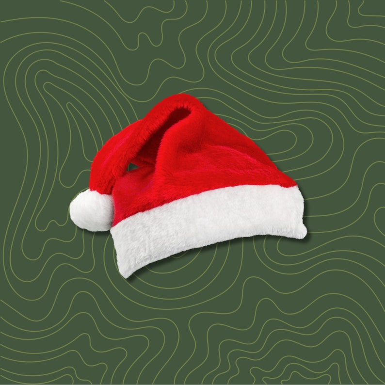 May include: A red and white Santa hat with a white pom-pom on top. The hat is lying on a green background with a wavy pattern.