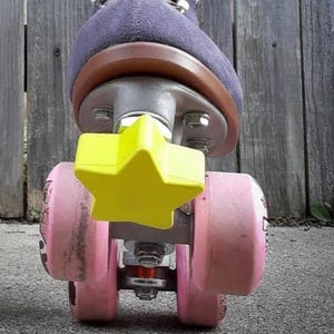 Frenos de estrella ROLLERSTUFF TWINKLE TOES, amarillo noche estrellada (par)