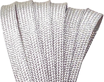 May include: Silver metallic cord, a type of trim or ribbon, is folded and stacked in a fan shape. The cord has a textured, woven appearance.