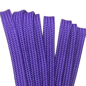 May include: Purple shoelaces made of a woven material. The shoelaces are folded in half and stacked on top of each other.