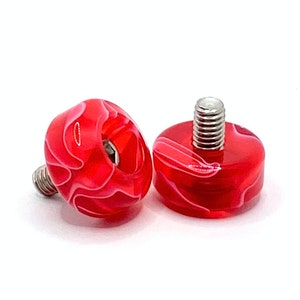 Bolt-on  Red Swirl Roller Skate Toe Plugs · Jam Plugs · Dance Plugs