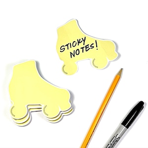 May include: Yellow sticky notes shaped like roller skates. One note says "STICKY NOTES!" and the other is blank. A yellow pencil and a black marker are also in the image.
