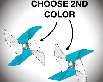 Puede incluir: Dos molinetes azules con aspas blancas y centros plateados. El texto "CHOOSE 2ND COLOR" está por encima de los molinetes.
