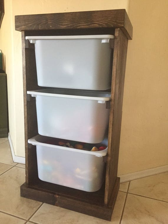 wooden toy shelf with bins