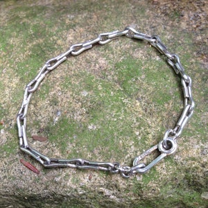 Handmade sterling silver bracelet with sister hooks