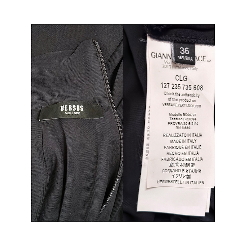 May include: Black dress with a zipper closure and a white label with the text "VERSUS VERSACE" and a white tag with the text "GIANNI 155/80A ACE" and "CLG 127 235 735 608" and "Check the authenticity of this product on VERSACE CERTILOGO.COM" and "Modello BD00797 Tessuto BJ20394 PROVRA 2016/2140 RN 118881" and "REALIZZATO IN ITALIA MADE IN ITALY FABRIQUE EN ITALIE HECHO EN ITALIA FABRICADO EM IT&Aacute;LIA 意大利制造 СОЗДАНО В ИТАЛИИ イタリア製 HERGESTELLT IN ITALIEN"