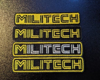 May include: Four black and yellow embroidered patches with the word "MILITECH" in white, black, and yellow lettering.