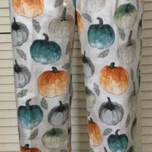 Flannel pajama pants for women/Pumpkins on pearl white background
