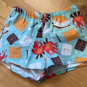 Sm/Campfire junk food on teal background flannel sleep shorts