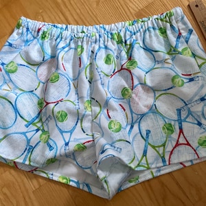 Lg/Tennis rackets on white background flannel sleep shorts