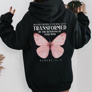 Transformed Romans 12:2 Christian Bible Jesus Apparel Butterfly Hooded Sweatshirt