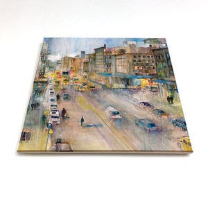 May include: A watercolor painting of a city street scene with buildings, cars, and people. The buildings are painted in shades of brown and gray, and the cars are painted in shades of white, gray, and black. The people are painted in shades of blue and gray.