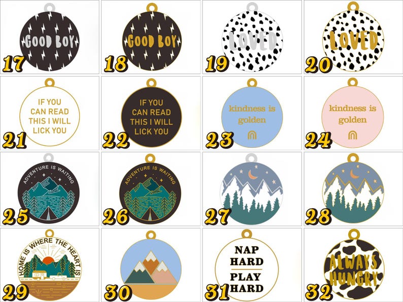 May include: A collection of sixteen circular pet ID tags featuring various designs, including lightning bolts, animal prints, mountain landscapes, and text phrases like Good Boy, Loved, If You Can Read This I Will Lick You, Kindness Is Golden, and Nap Hard Play Hard.