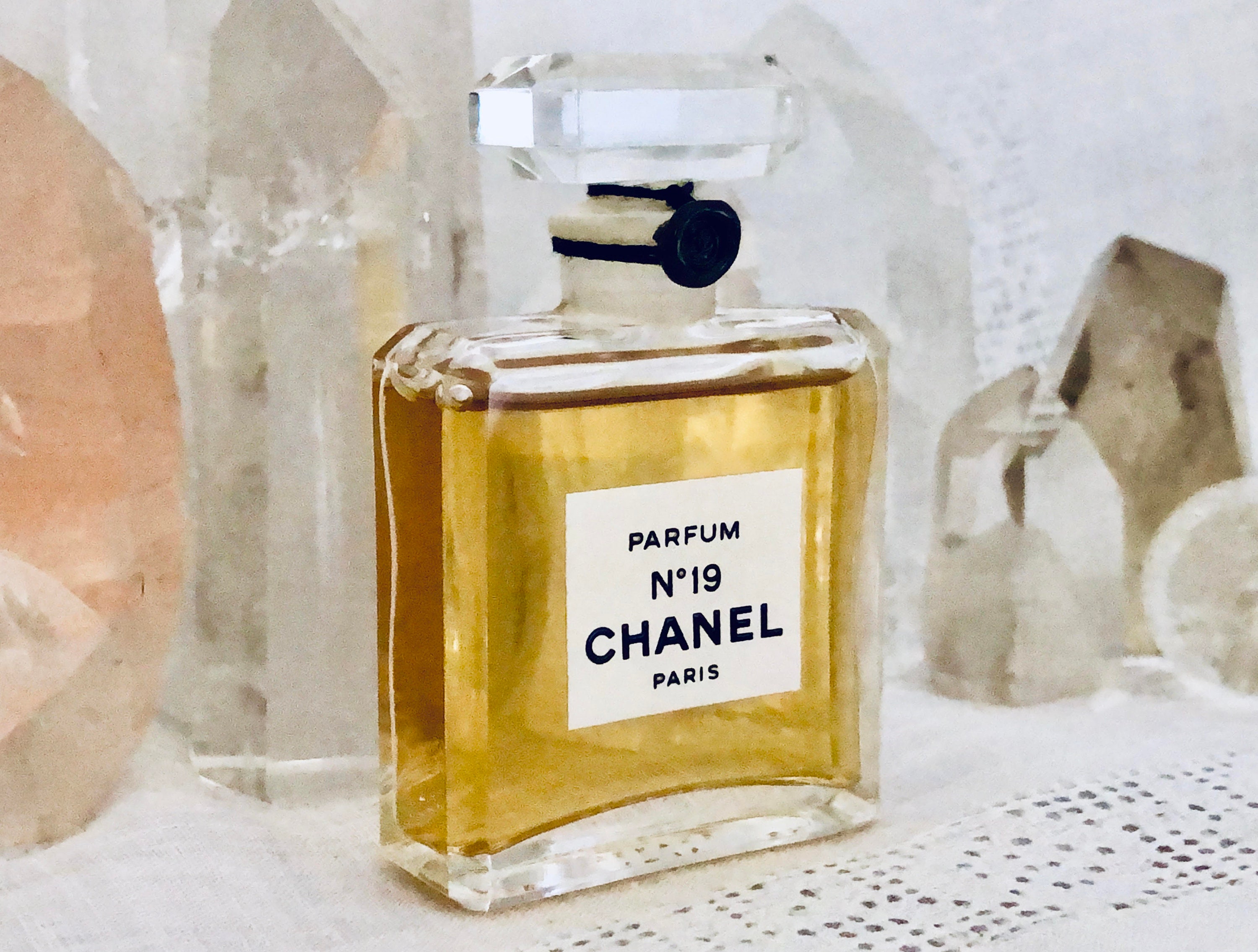 Chanel Perfume Bottle Invert» Throw Pillow by Mercedes Lopez Charro