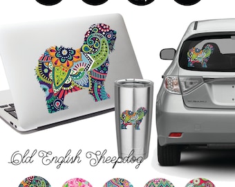 May include: A colorful paisley pattern Old English Sheepdog silhouette decal. The decal is shown on a laptop, car window, Yeti cup and tablet. The decal is available in five different paisley patterns.