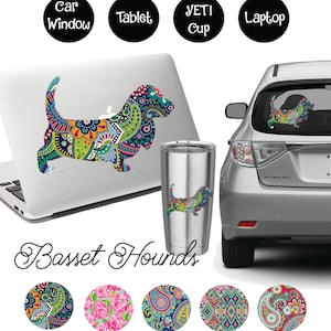 Könnte beinhalten: Ein farbenfroher Paisley-Muster-Basset-Hound-Aufkleber für Autofenster, Laptops, Tablets und Yeti-Becher. Der Aufkleber ist in fünf verschiedenen Paisley-Mustern erhältlich.