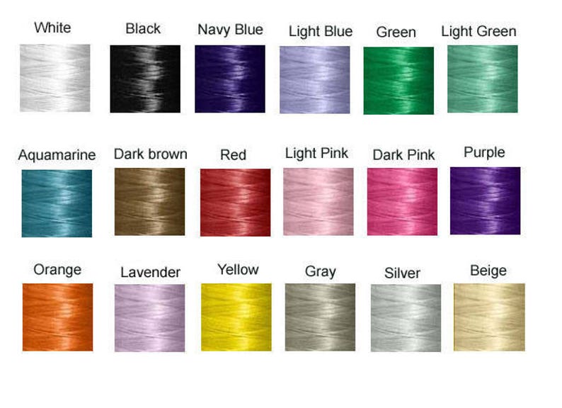 May include: A color chart of thread spools in various colors, including white, black, navy blue, light blue, green, light green, aquamarine, dark brown, red, light pink, dark pink, purple, orange, lavender, yellow, gray, silver, and beige.