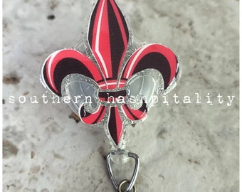 Ragin Cajun Fleur De Lis Badge Reel