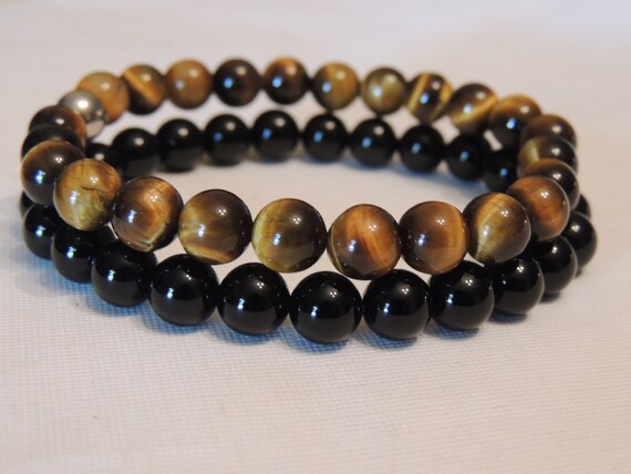 tiger eye and black onyx gemstone healing bracelet with angel charm elasticated