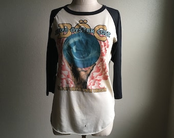 vintage 80s 1981 boc blue oyster cult fire of unknown origin rock band concert fan psychedelic raglan t shirt