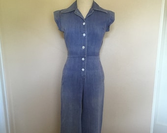 vintage 70s montgomery ward blue jean button up denim bell bottom jumpsuit womens coveralls wide leg hippe boho high waist 1970s tie back