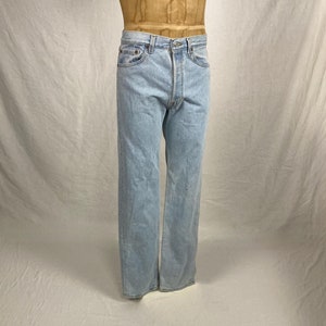 vintage 90s levis 501 blue jeans made in usa 31 32 light wash button fly