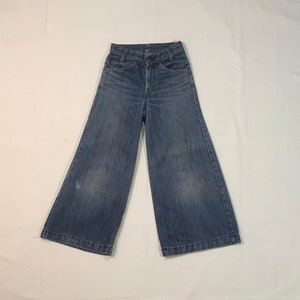 vintage 70s levis orange tab bells denim hip hugger made in usa zip fly bell bottom blue jeans 24 x 23 1/2