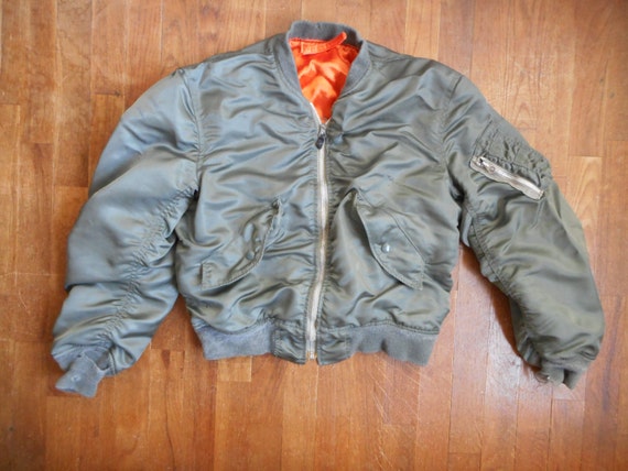 green bomber jacket orange lining
