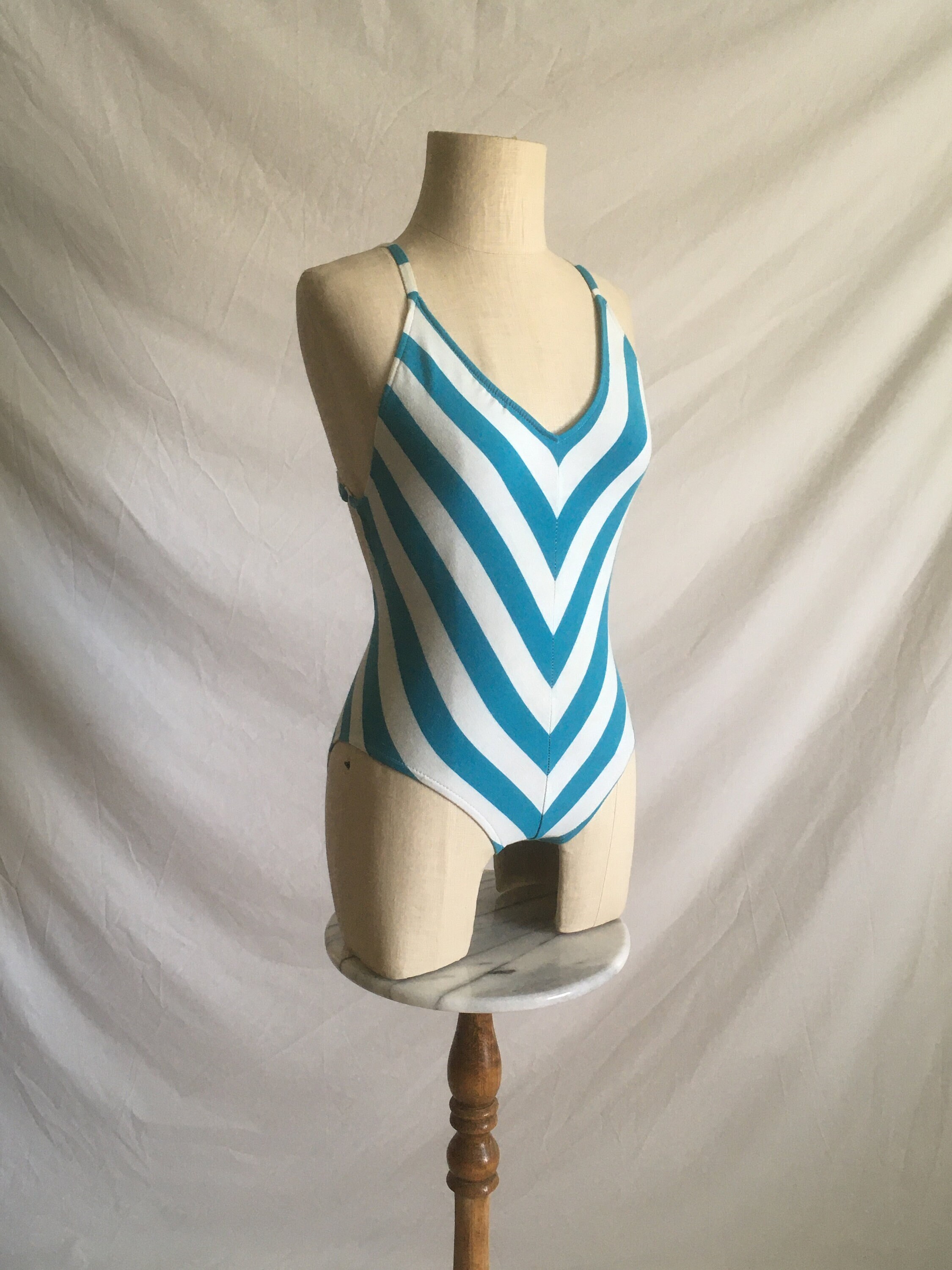 vintage 80s sassafras swimsuit cotton blend blue white chevron striped  cross back plunge back bathing suit 1980s summer fashion
