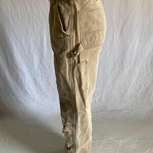 May include: A set of three ceramic mugs with a speckled, matte finish. Each mug features a different color: light blue, cream, and gray. The mugs have a simple, modern design and a comfortable handle.