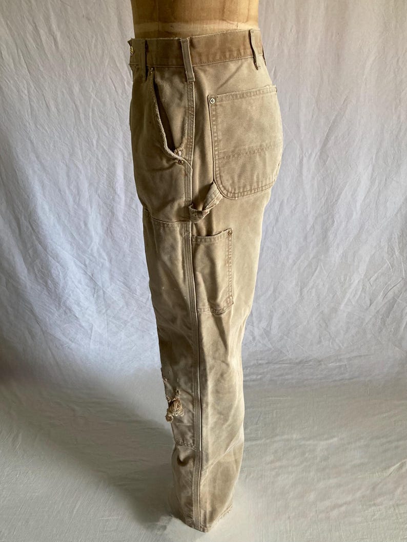 May include: A set of three ceramic mugs with a speckled, matte finish. Each mug features a different color: light blue, cream, and gray. The mugs have a simple, modern design and a comfortable handle.