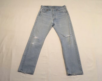 vintage 90s levis 501 xx blue jeans made in usa light wash knee holes worn in denim 30 x 30