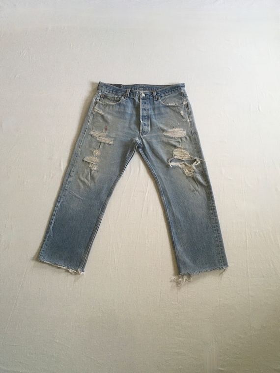 vintage 90s levis 501 xx ripped frayed blue jeans 