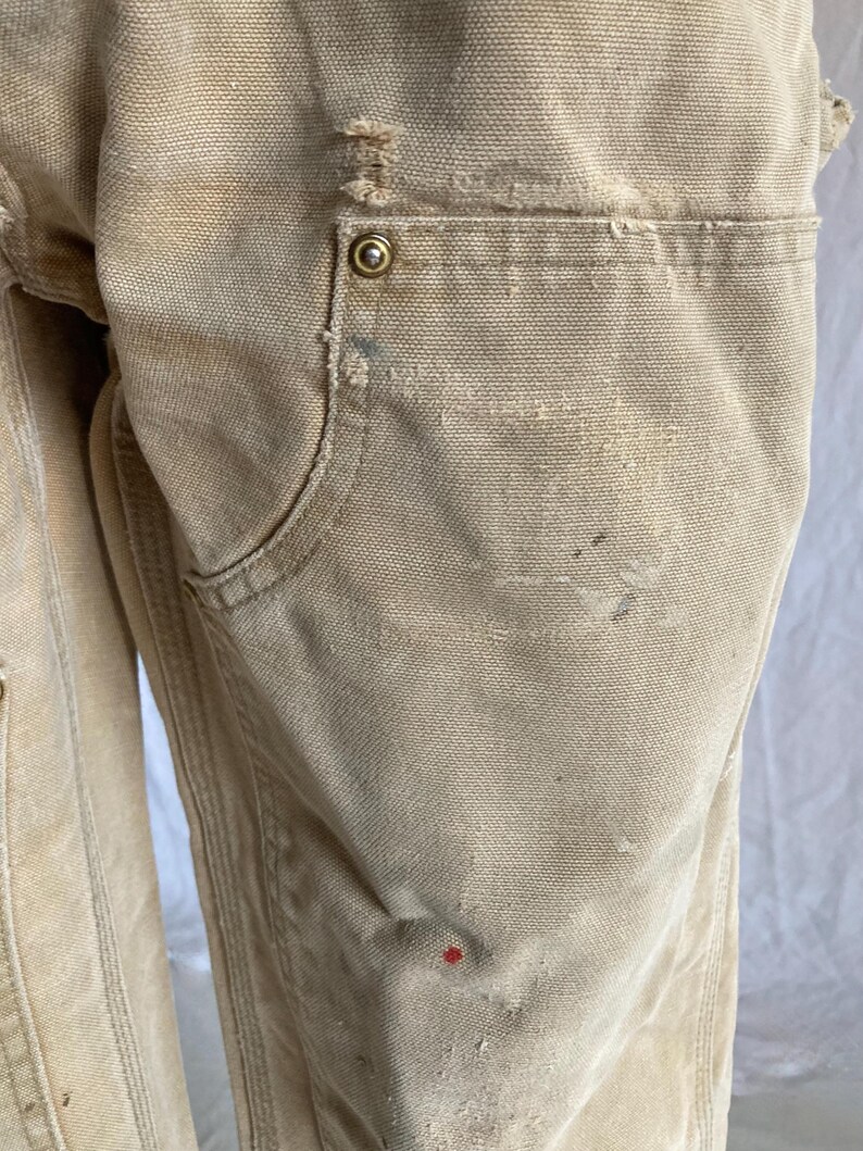 May include: A rustic wooden sign with the text "Welcome to our home" in white lettering. The sign features a distressed finish and a simple, inviting design, perfect for entryway decor.